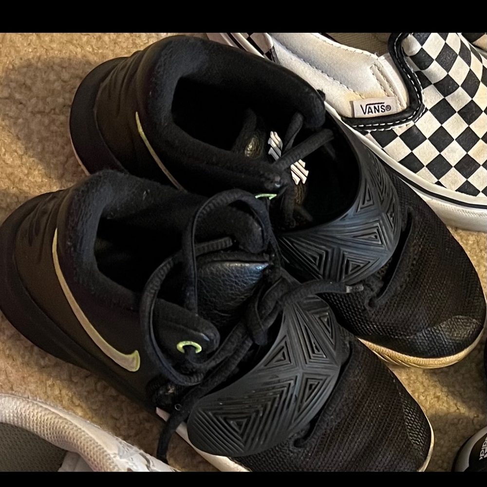Kids black Nikes size 12